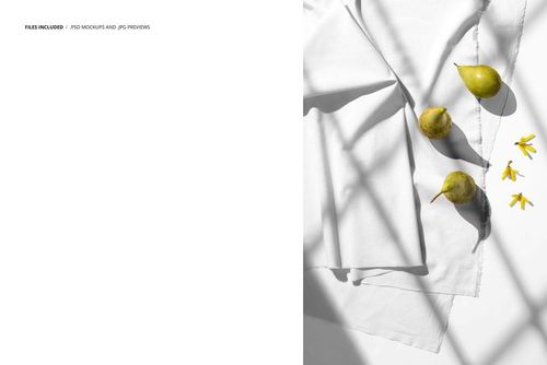 White cotton fabric mockup displayed in bright sunlight with shadows, accompanied by three pears and yellow flower petals.