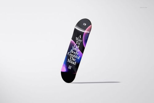 Front view of a skateboard deck mockup with glossy finish, displaying vibrant geometric design and prominent lettering.