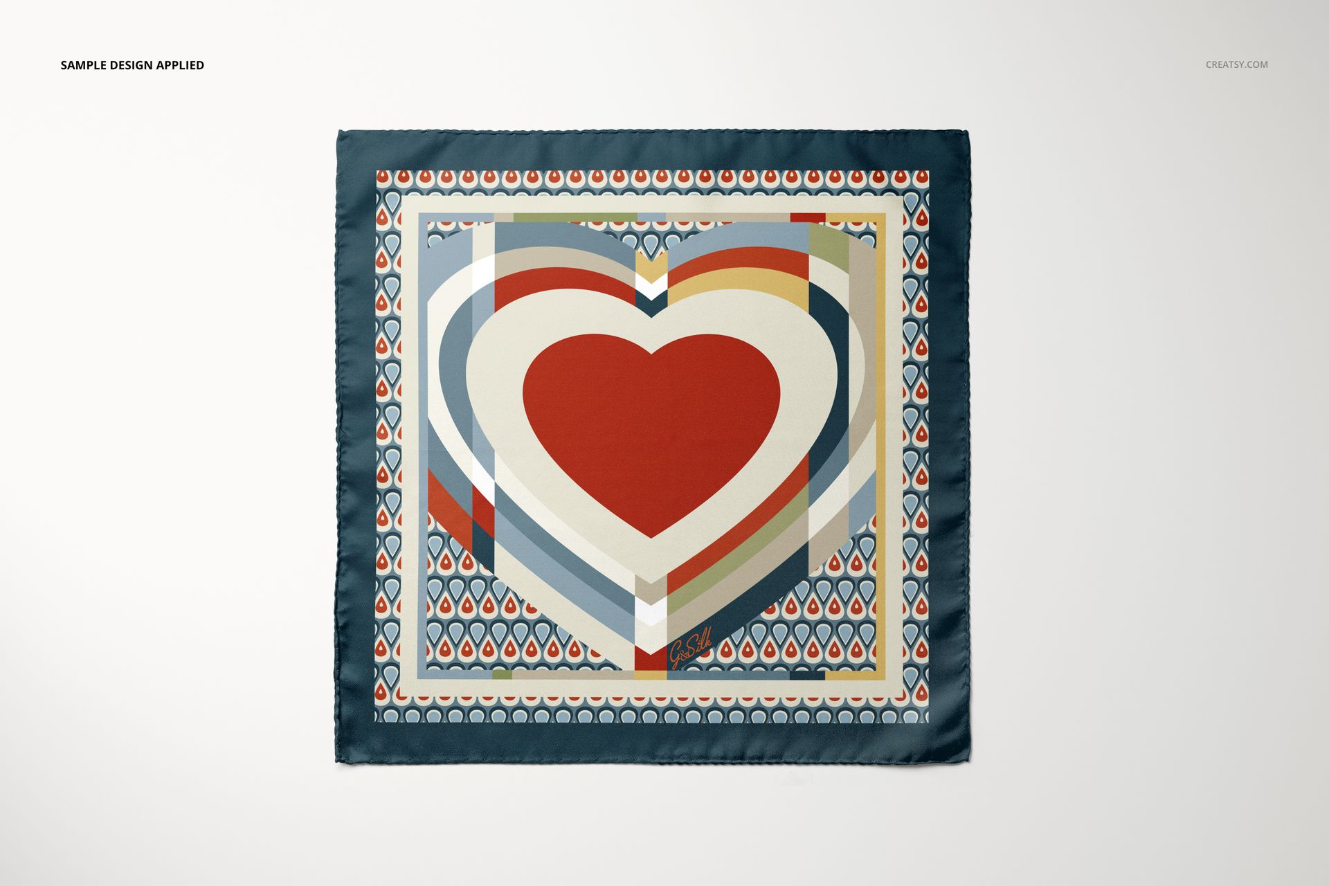 Rectangular pocket square mockup featuring a bold geometric heart pattern in red, beige, and blue tones, front view.
