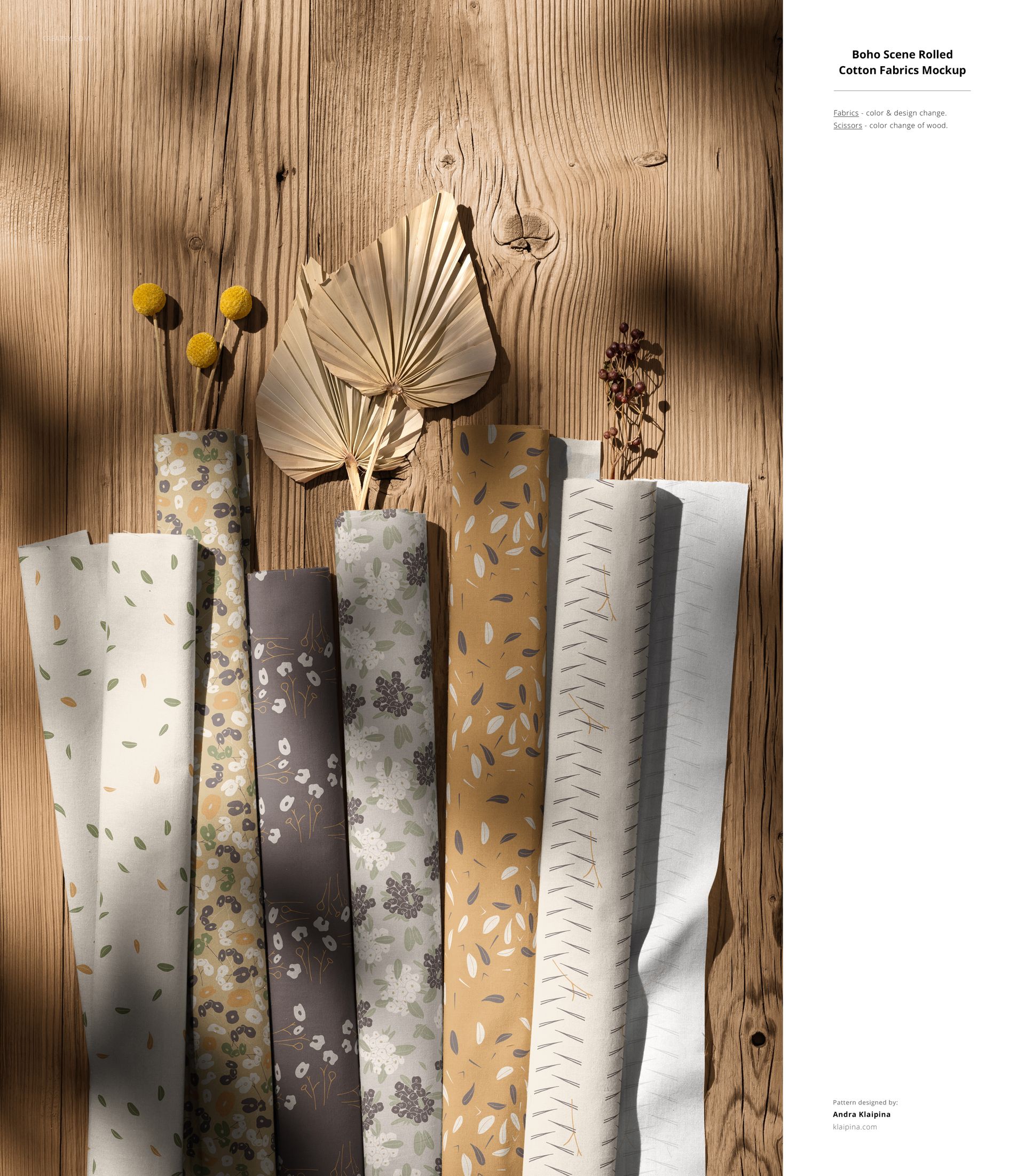 Rolled cotton fabric mockups with various botanical patterns, displayed on a wooden surface with dried flowers and leaves.