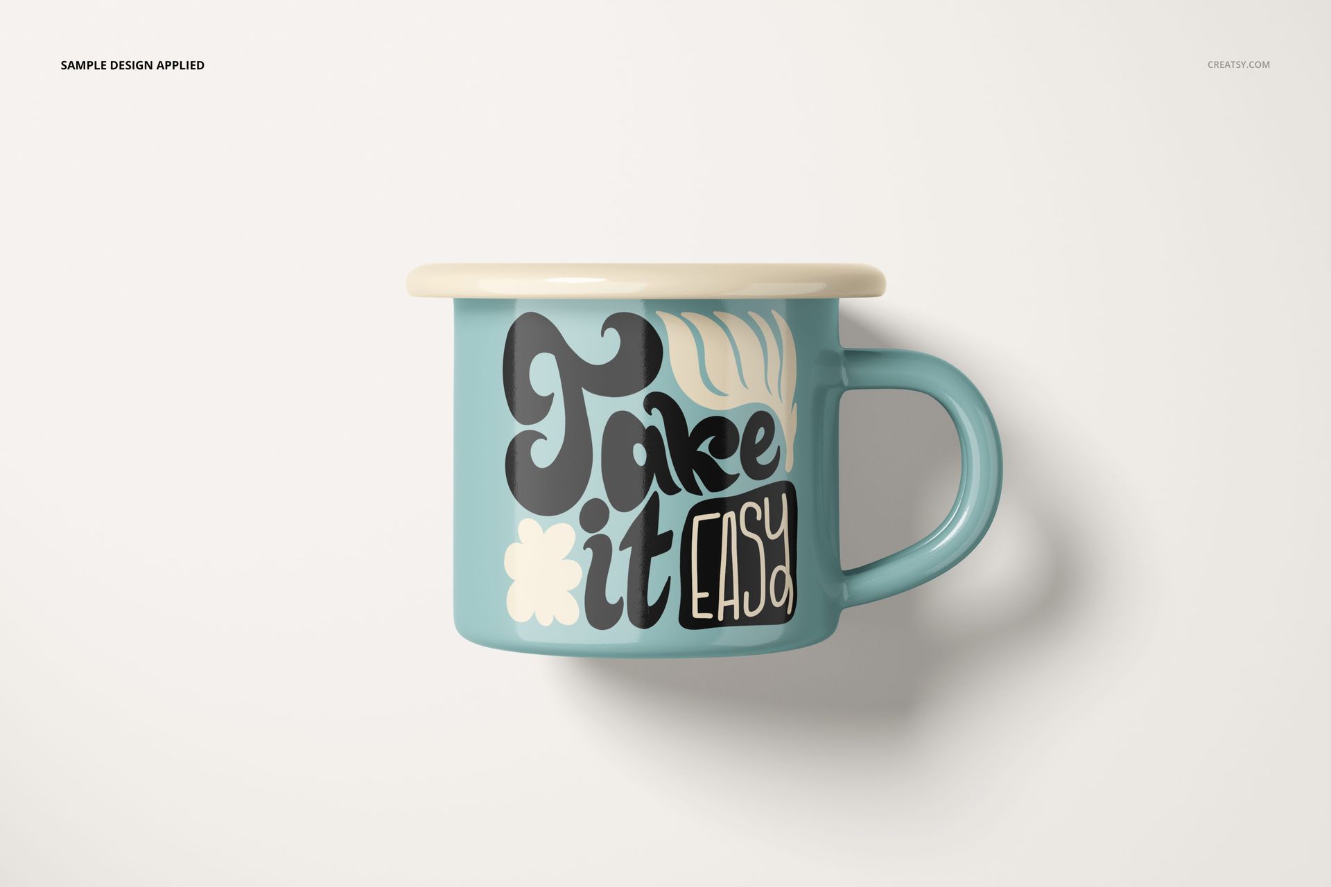 Light blue enamel mug with a cream rim, featuring retro-style black and white text and floral graphics, front view on white background.