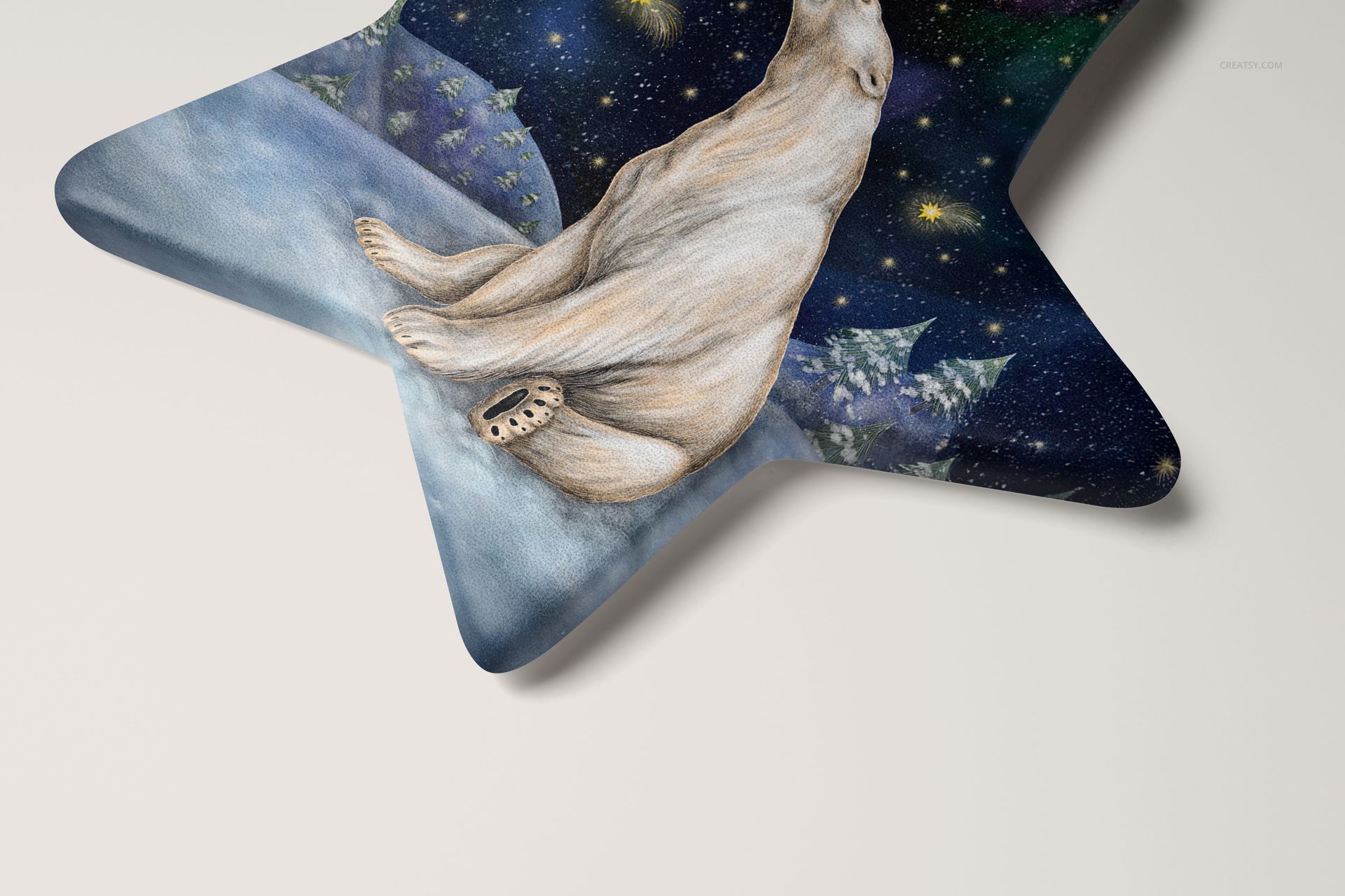 Star-shaped Christmas ornament mockup featuring a painted polar bear on a snowy landscape under a starry night sky.