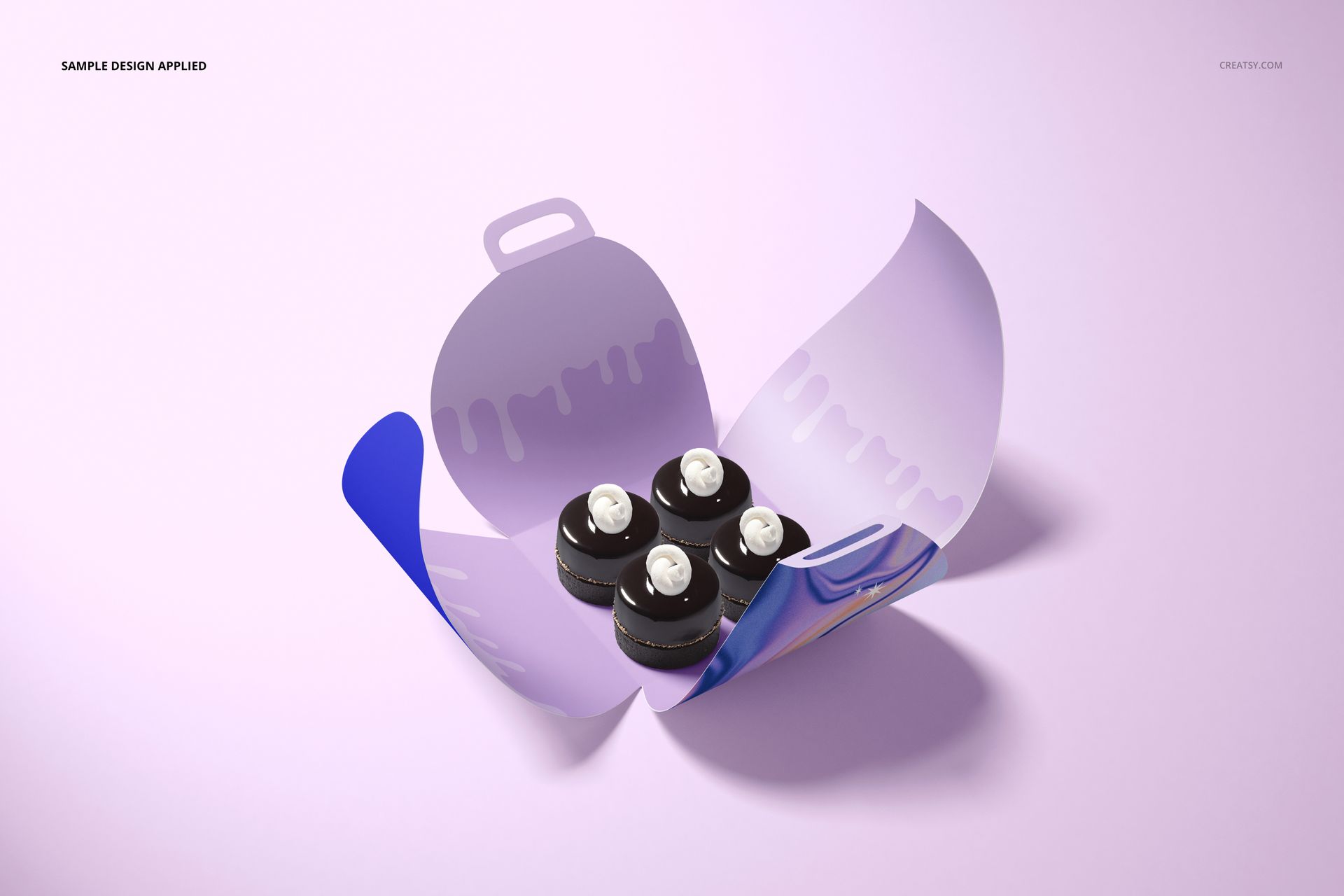 Curved cake box mockup shown open on a light purple surface, revealing four small cakes inside the packaging.