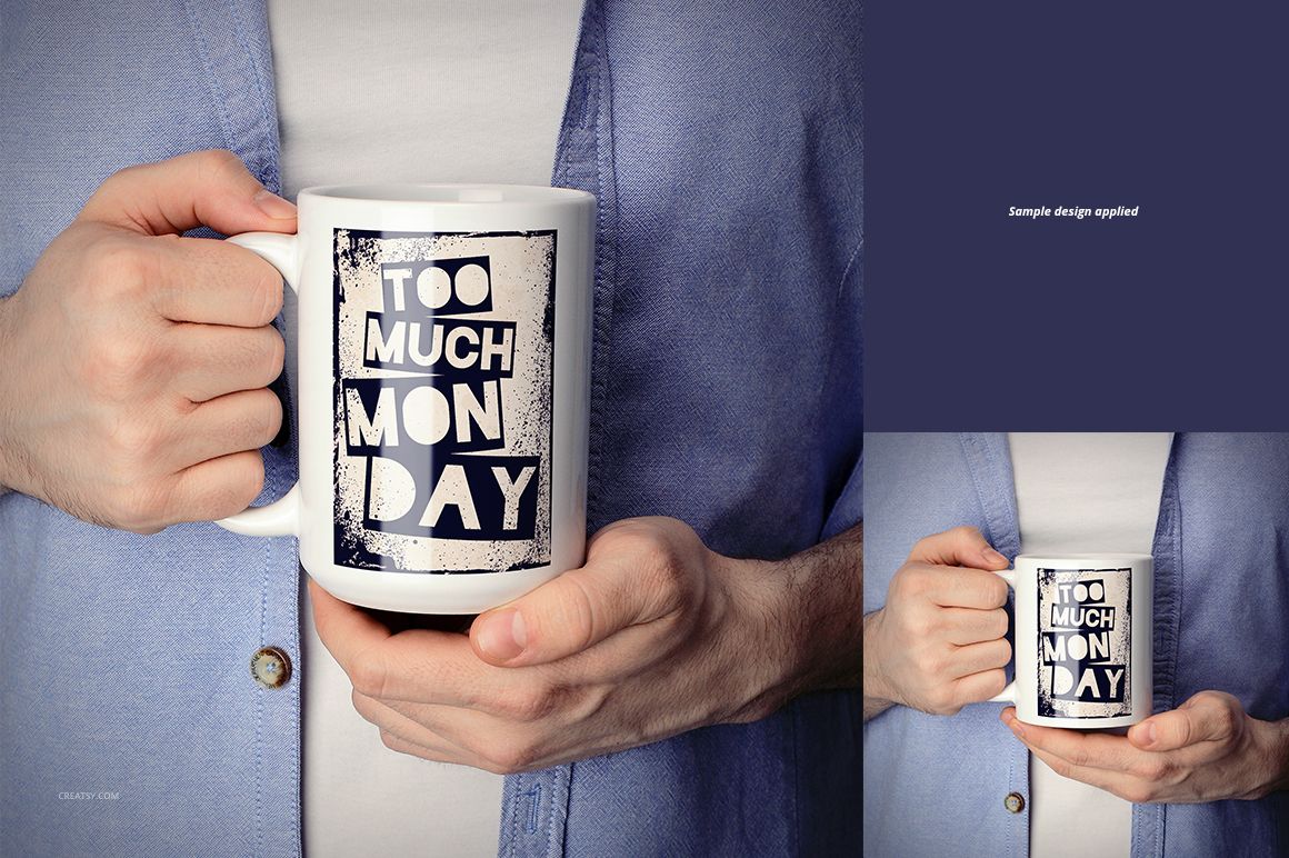 Front view of a person holding a white ceramic mug with a bold blue and white graphic design reading 'Too Much Monday'.
