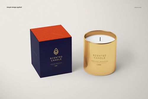 Classic candle PSD mockup featuring a gold metallic container and matching box, both displayed on a neutral surface.