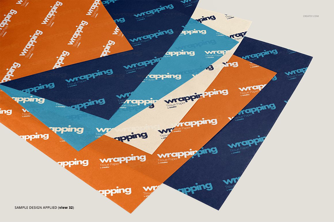 PSD mockup of wrapping tissue paper sheets featuring various colors and sample text, displayed in a layered arrangement.