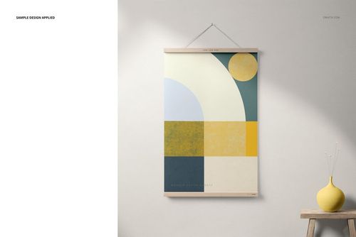 Wooden poster hanger mockup with a modern geometric print in blue, yellow, and cream, shown against a neutral wall.
