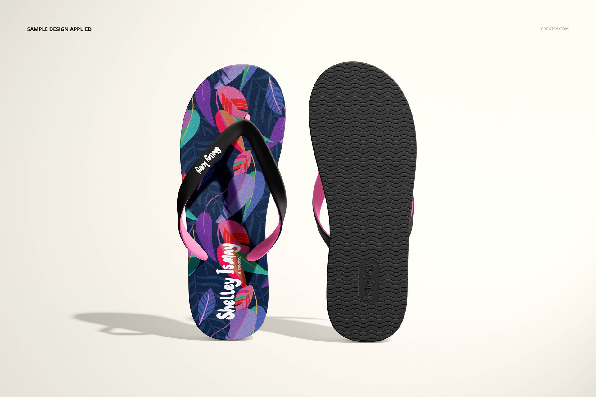Flip flops mockup set with one sandal featuring a vibrant multicolor leaf design, viewed from above.