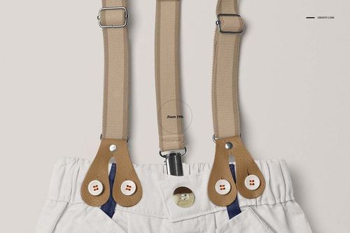Close-up front view of a boys formal set mockup showing beige suspenders attached to white trousers with buttons.
