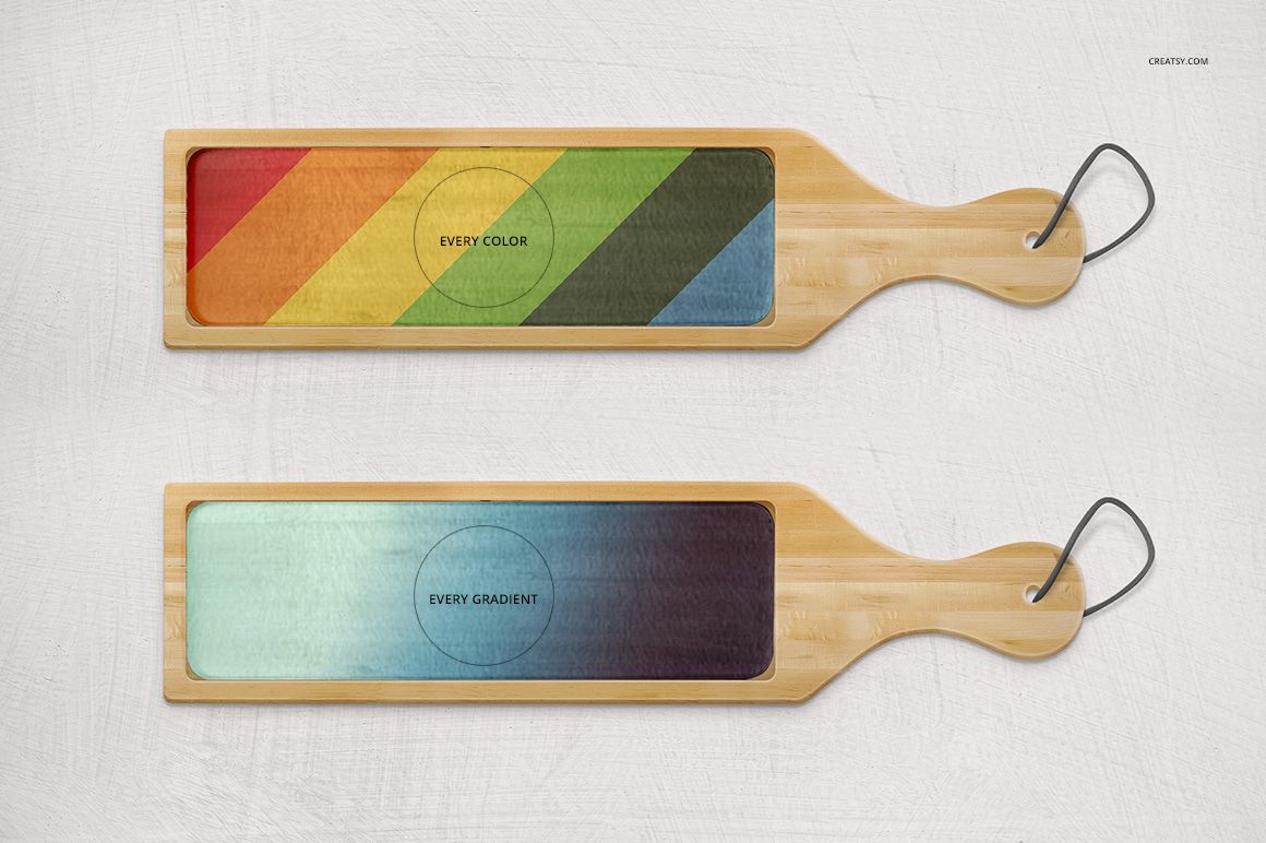 PSD mockup showing two light wood chopping boards with glass sections, each displaying a different color pattern.