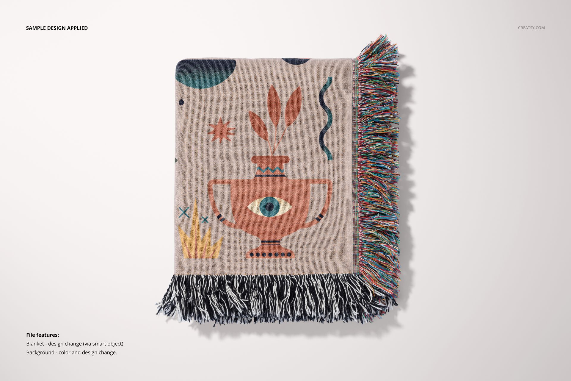 Jacquard throw blanket mockup featuring multicolored fringe and geometric pattern, shown from a top view.