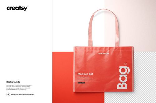 Front view of a laminated non-woven tote bag mockup in red with transparent handles, displayed on a color-block background.