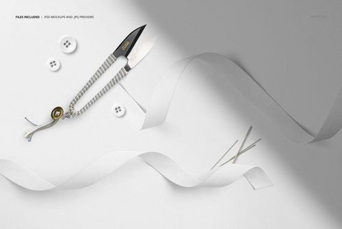 Cotton ribbon mockup with sewing tools including thread snips, buttons, and needles displayed from above.