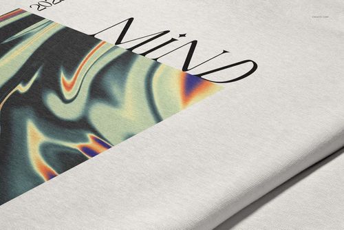 Close-up view of a light-colored oversized hoodie mockup featuring a wavy abstract graphic and bold text design.