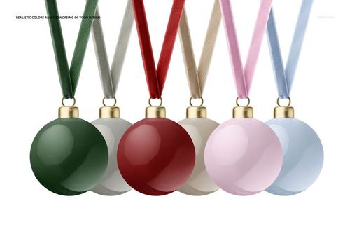 PSD mockup featuring five glossy Christmas baubles in assorted colors, each suspended by a different velvet ribbon.