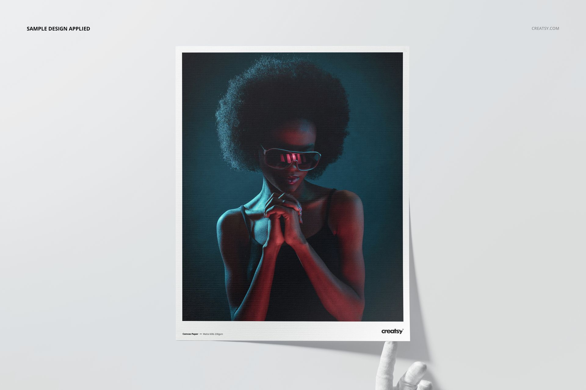 Canvas paper print mockup featuring a portrait with dark tones, shown from a front angle on a white background.