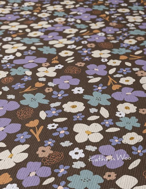 Angled view of jersey fabric mockup featuring a floral pattern in blue, purple, white, and brown colors.