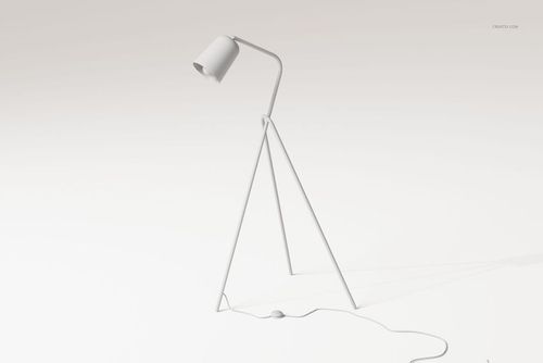 Minimalist grasshopper style floor lamp with angled tripod legs and a cylindrical shade, shown on a light background.