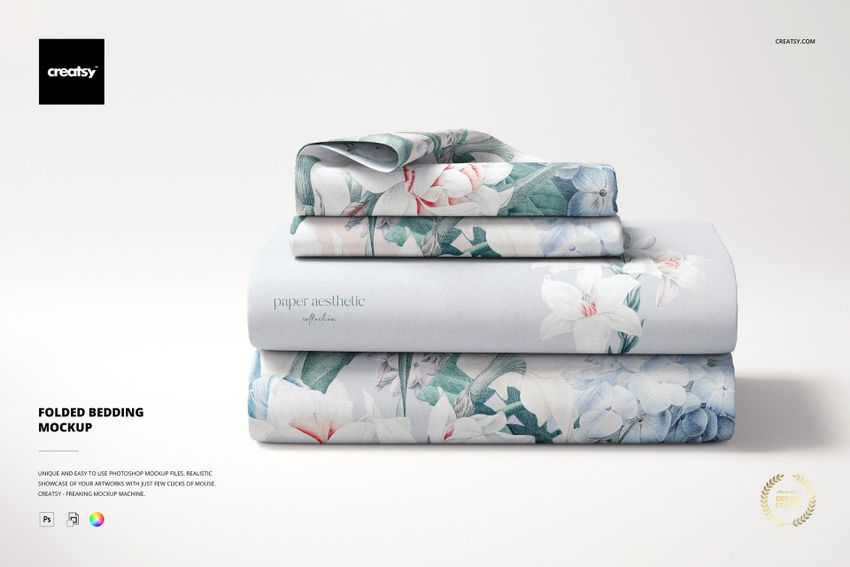 Stacked bedding set mockup with soft pastel floral designs, displayed folded and viewed from the front on a plain background.