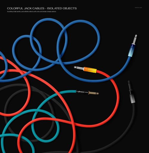 Colorful audio jack cables in blue, red, and black arranged on a dark background, viewed from above.
