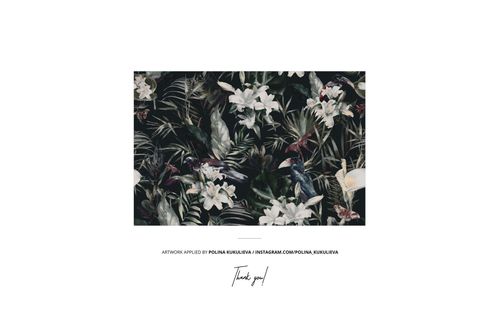 Rectangular muslin baby wrap mockup featuring a dark floral pattern with white lilies and green leaves, front view.