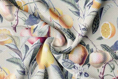 Bullet fabric mockup featuring a close-up view of twisted material with a fruit and leaf pattern in soft colors.