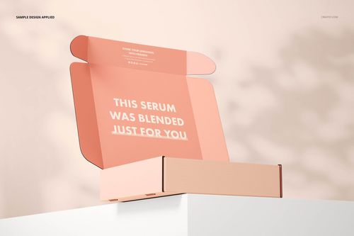 Open cosmetic mailing box mockup in pastel peach tones, front angle view with lid upright and visible interior text.