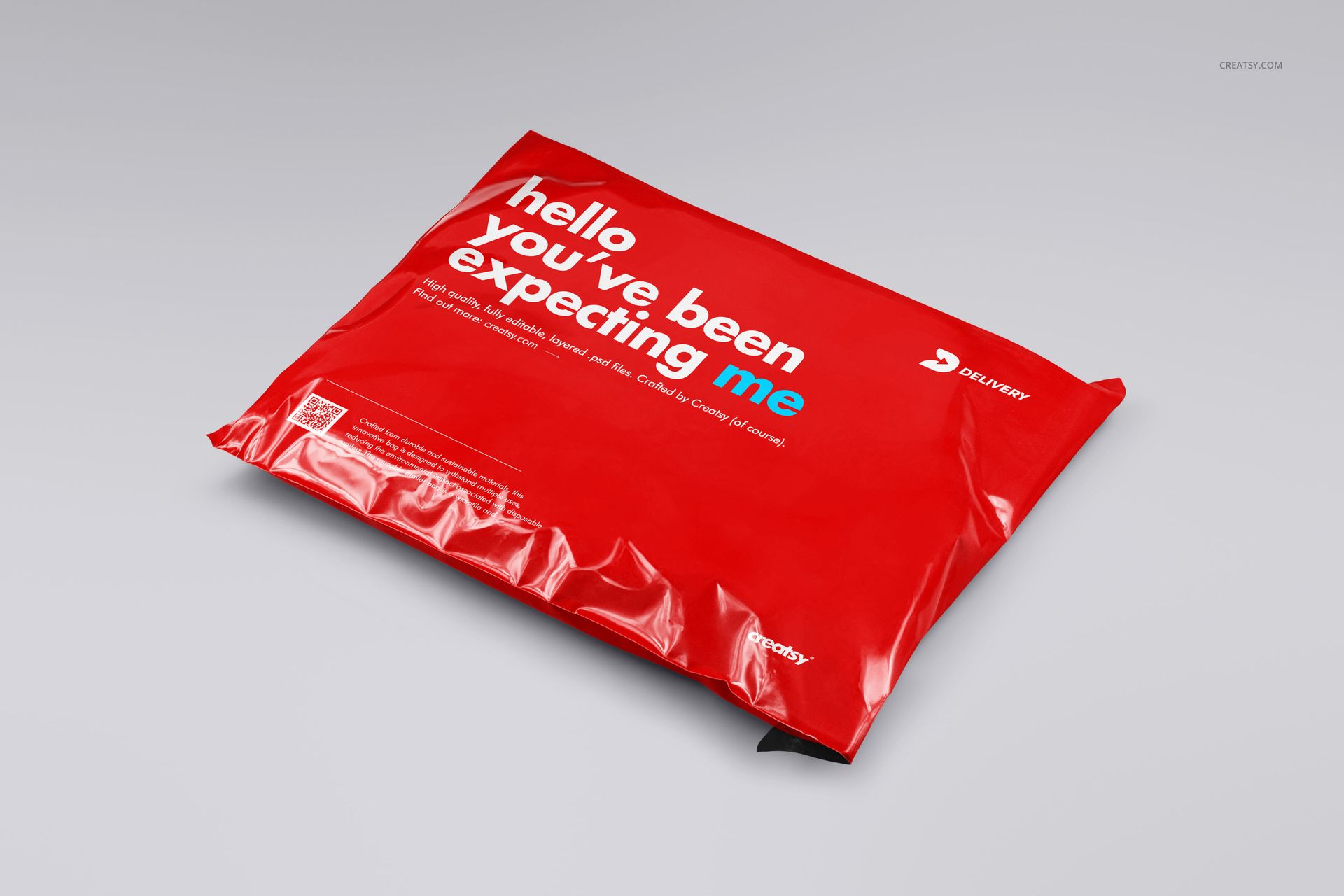 Poly mailer mockup featuring a glossy red surface and bold white lettering, displayed on a neutral backdrop.