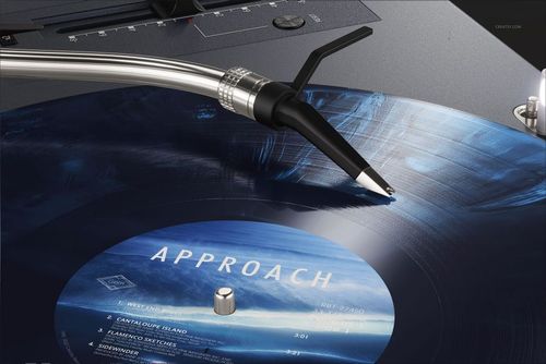 Detailed PSD mockup of a colored vinyl record featuring swirling blue tones, turntable and stylus arm visible in foreground.