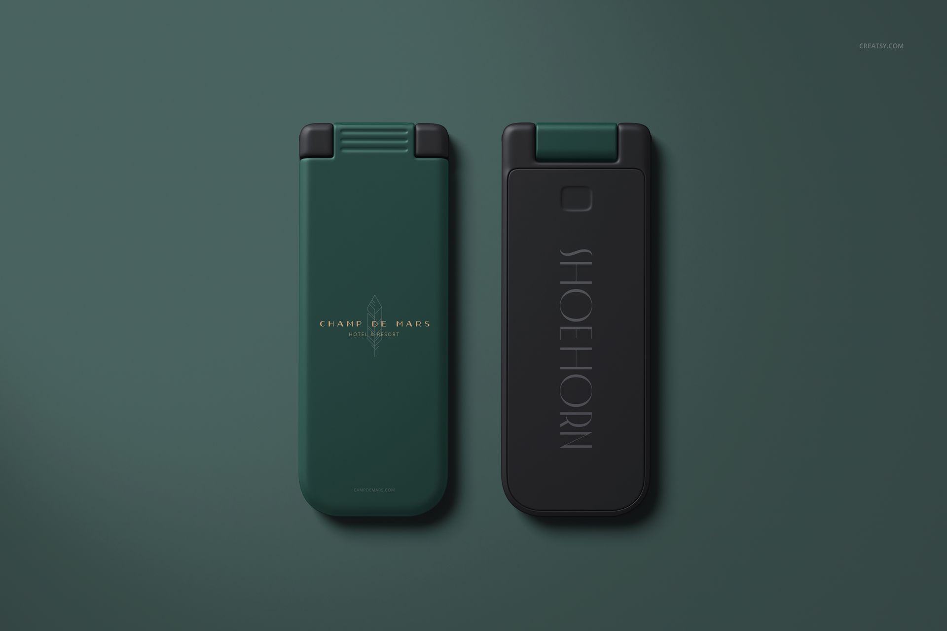 Front view of two folding lint brush and shoe horn mockups, one in matte green and one in matte black, side by side.