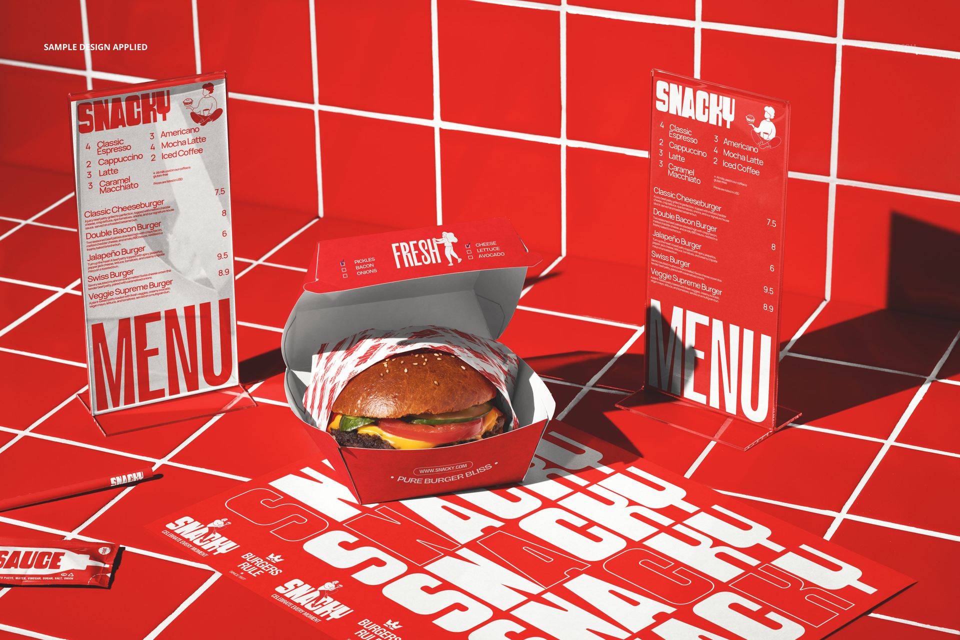 Front view of a burger bar menu display mockup with red packaging, burger box, and printed menus on a tiled surface.
