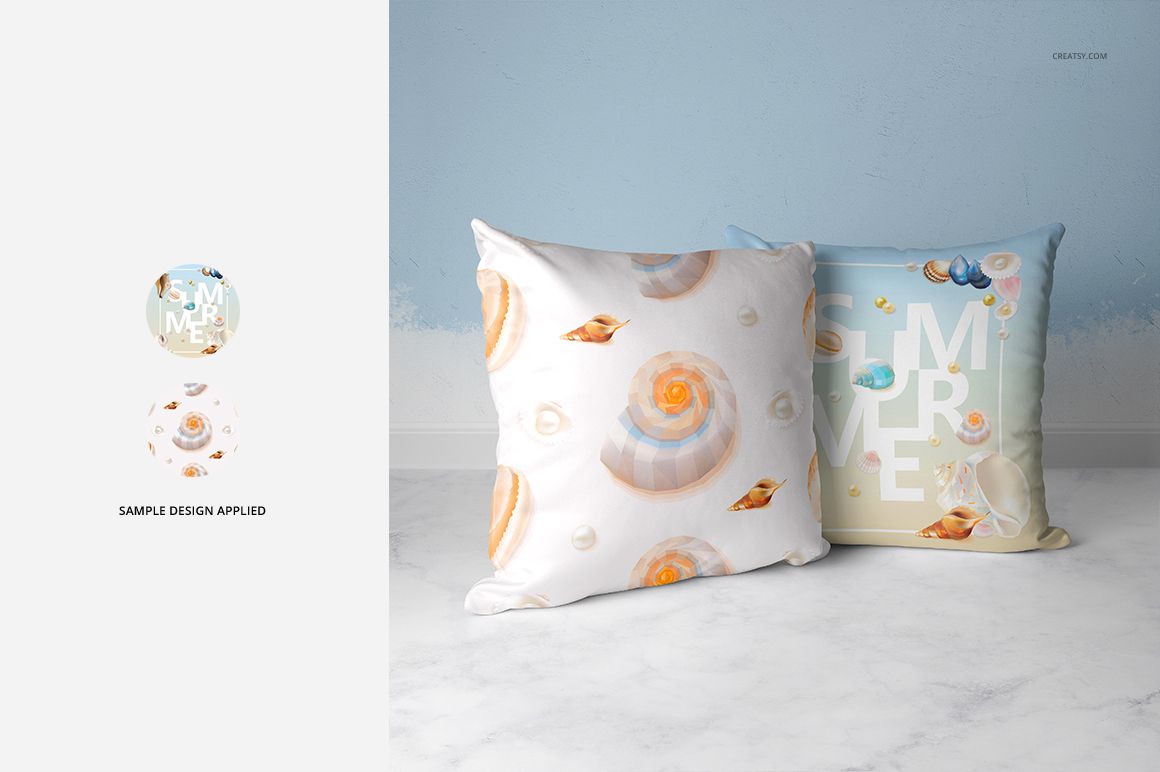PSD mockup of two throw pillows featuring pastel seashell motifs, placed side by side on a white surface.