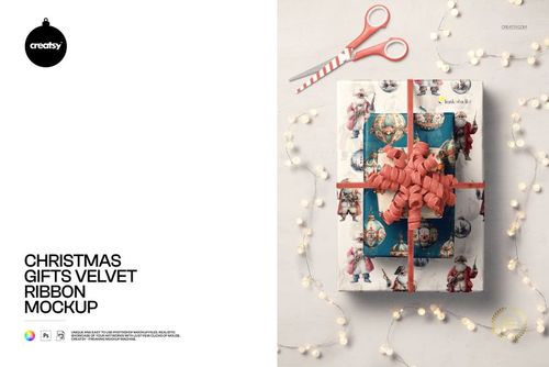 Christmas gift box mockup featuring a decorative velvet ribbon and holiday-themed wrapping paper, viewed from above.