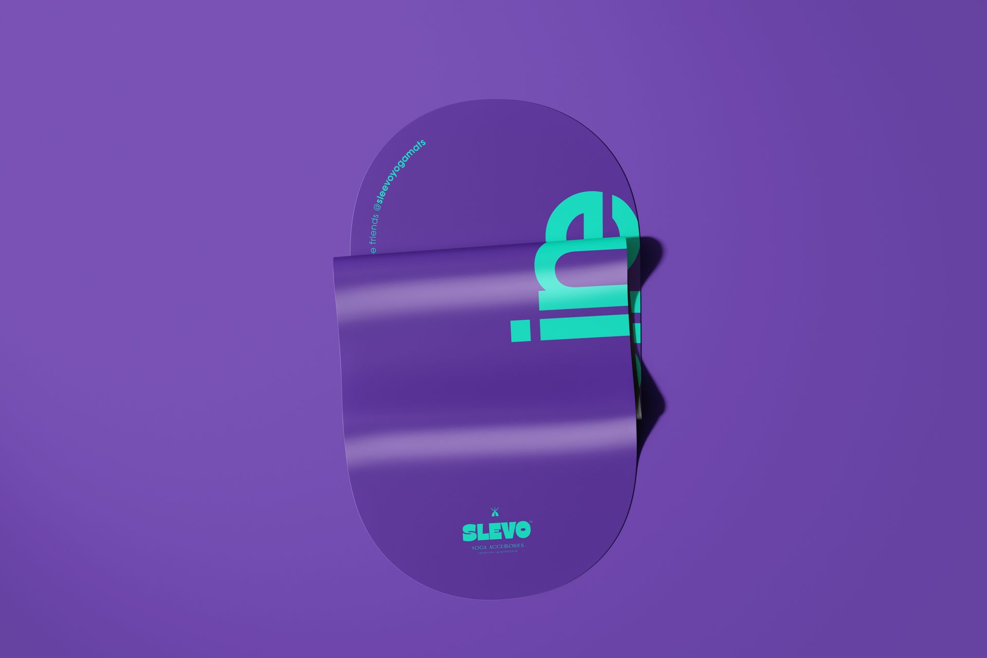 Folded oval yoga mat mockup with a purple surface and turquoise text, shown from a top view on a matching background.