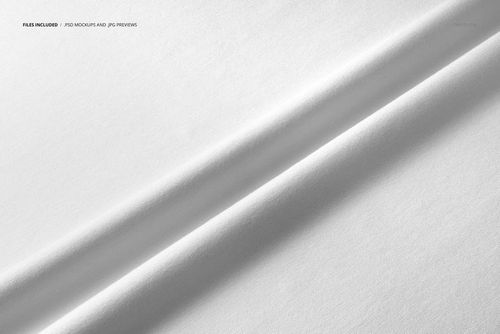 PSD mockup of white jersey fabric with subtle folds, top-down perspective highlighting material texture.