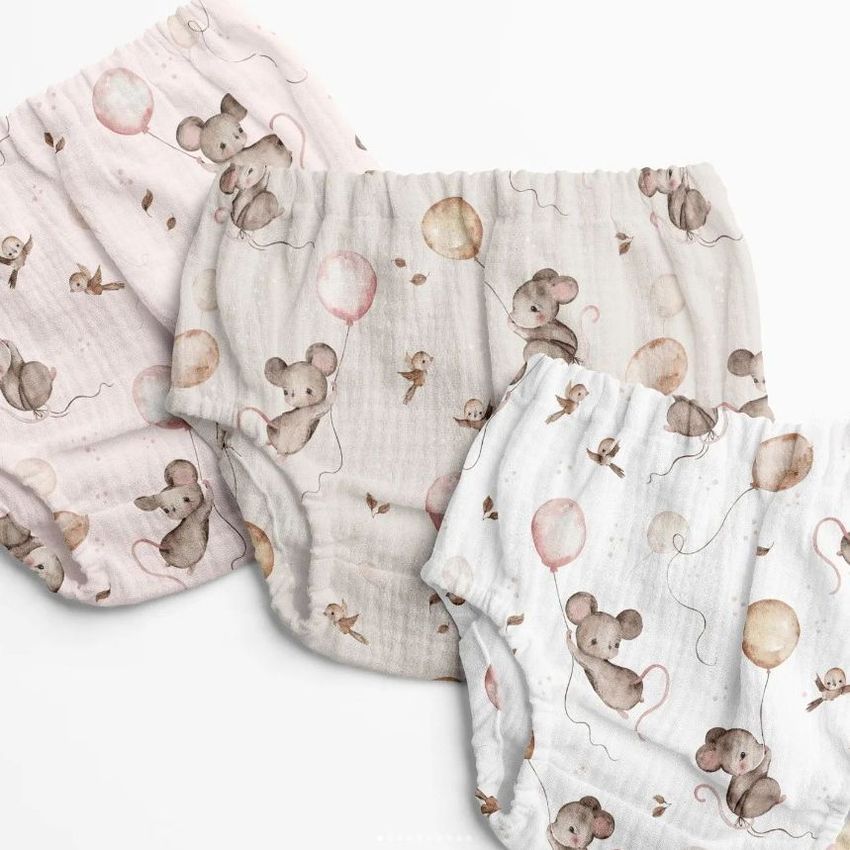 Three baby muslin pants mockups are arranged on a white background, each featuring a playful mouse and balloon pattern in soft pastel colors.