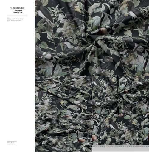 Top-down perspective of a fabric mockup featuring a detailed leafy design with birds and fruits on a black background.