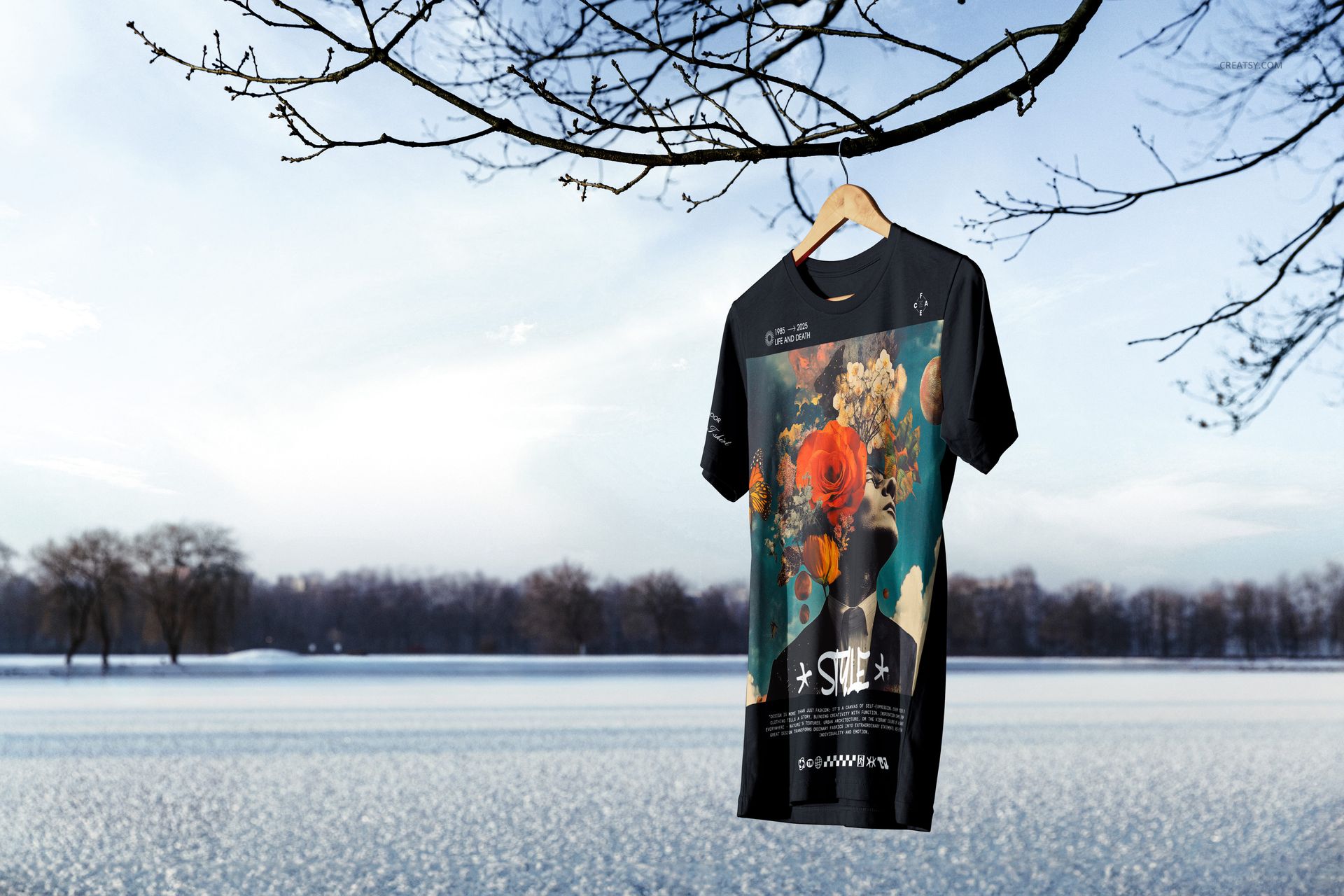 Front view of a Bella Canvas 3001 t-shirt mockup with a vibrant flower design, displayed outdoors in a winter landscape.