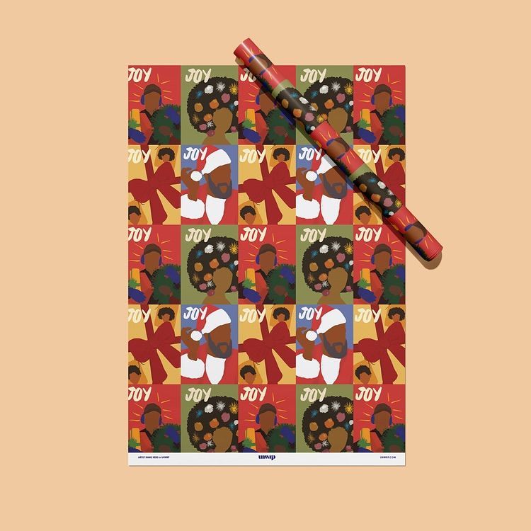 Gift wrapping paper mockup featuring a colorful pattern with abstract illustrations of people, wreaths, and the word 'JOY' repeated.