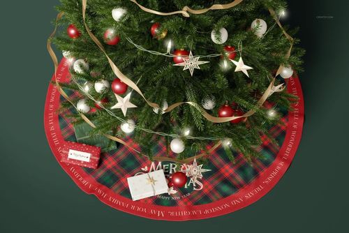 Christmas tree mockup featuring a red and green plaid skirt, assorted ornaments, and presents on a dark green floor.