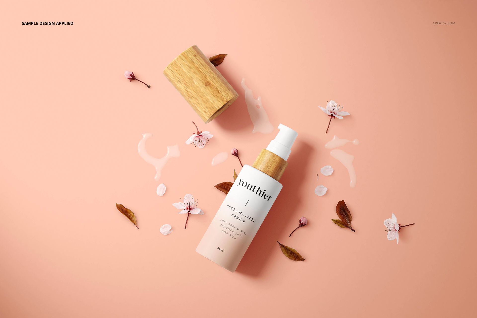 Minimalist cosmetic bottle mockup with bamboo-style cap, placed on a soft peach surface with floral accents.