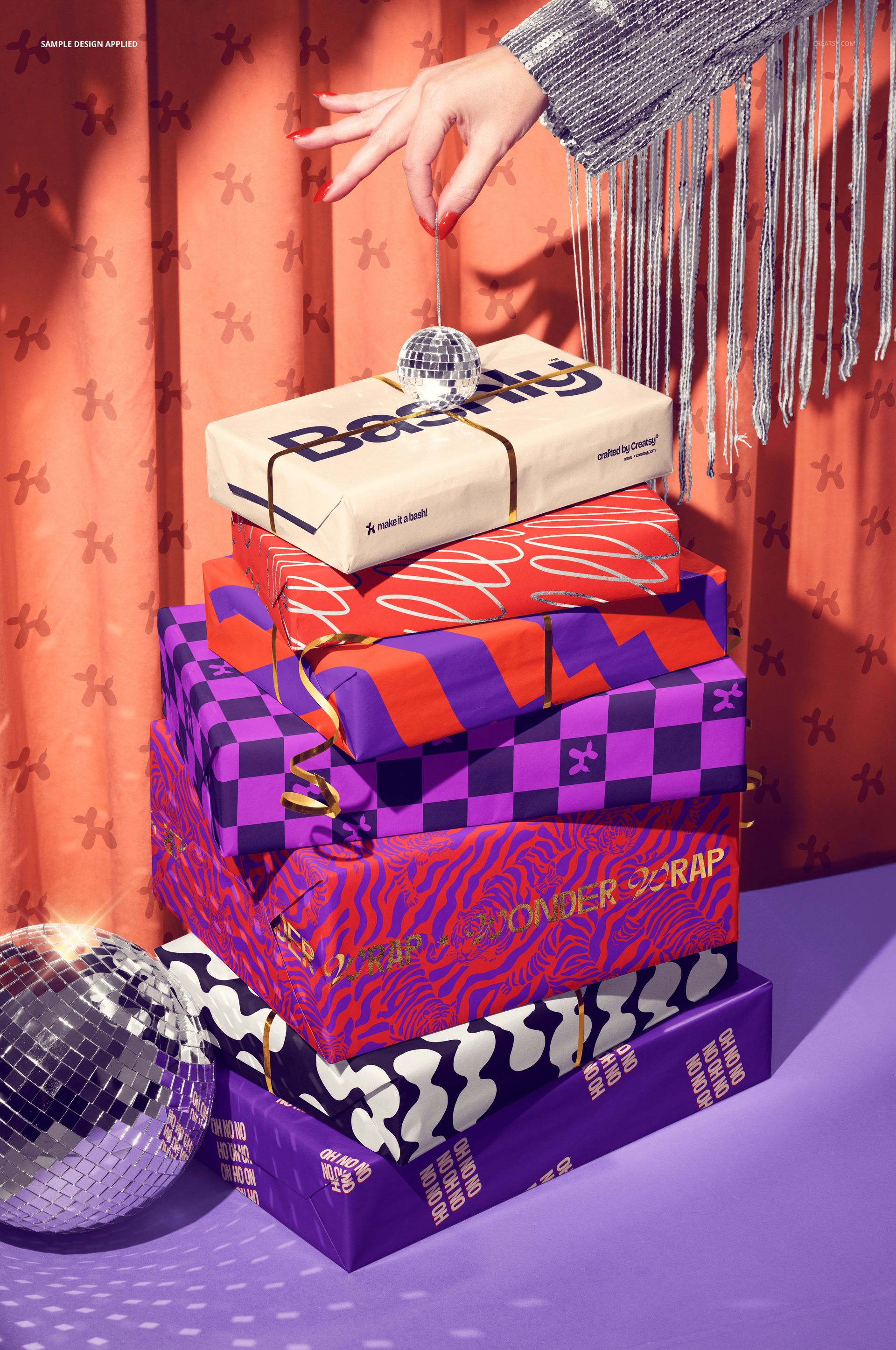 Stack of New Year’s gifts wrapped in colorful patterned paper, shown from a front angle against a festive backdrop.