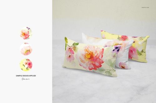 PSD mockup of rectangular pillows with pink and yellow floral prints, shown in a home setting on a light floor.