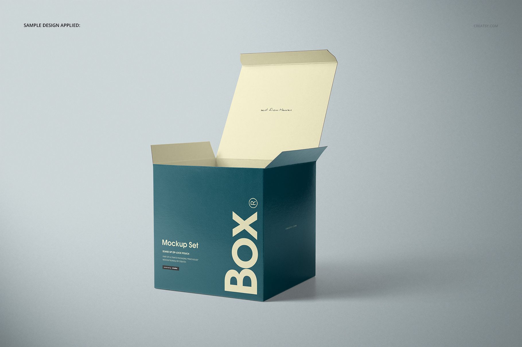 Open glossy square box mockup with teal sides and light cream lid, displayed on a neutral gray surface.