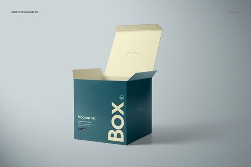 Open glossy square box mockup with teal sides and light cream lid, displayed on a neutral gray surface.