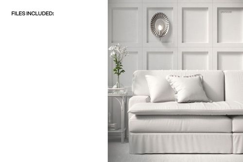 Front view of an upholstered sofa mockup in a living room with white walls, pillows, and a side table with flowers.