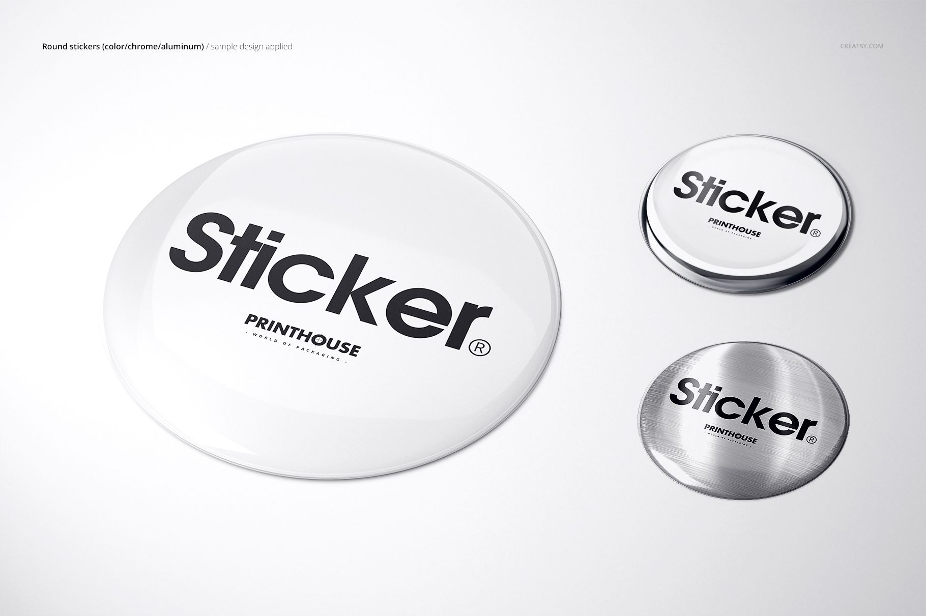 Mockup of round epoxy dome stickers in silver and white, arranged on a clean background with visible texture and shine.