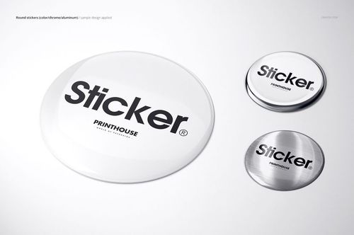 Mockup of round epoxy dome stickers in silver and white, arranged on a clean background with visible texture and shine.
