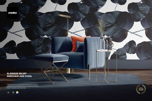 PSD mockup showing a blue velvet armchair and stool set against a bold leaf print wall, styled with cushions and decor.