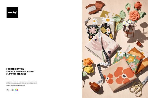 PSD mockup showing colorful cotton fabrics with flower designs, arranged with crochet decorations and craft supplies.